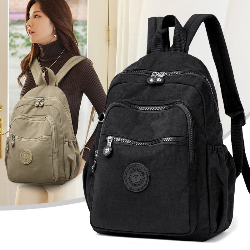 Mochila Feminina Leve e Impermeável com Design Casual e Vários Bolsos