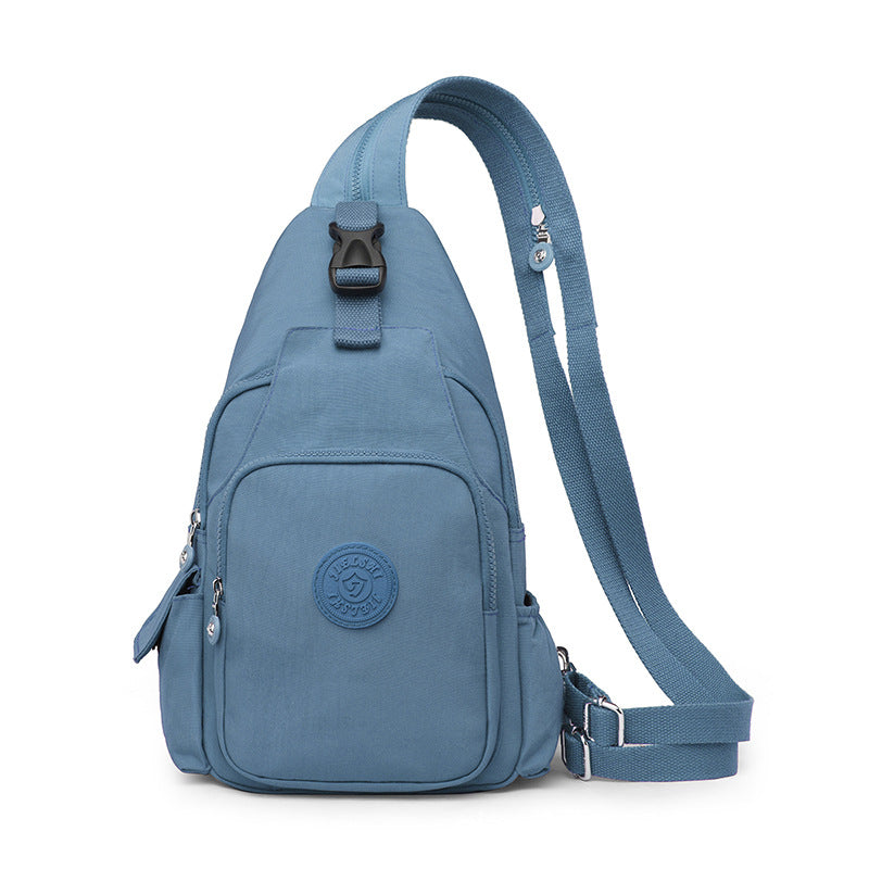 Mochila Bolsa Transversal Compacta Unissex – Uso de Ombro ou Costas, Material Impermeável, Leve e Versátil XV-2411