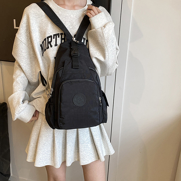 Mochila Bolsa Transversal Compacta Unissex – Uso de Ombro ou Costas, Material Impermeável, Leve e Versátil XV-2411