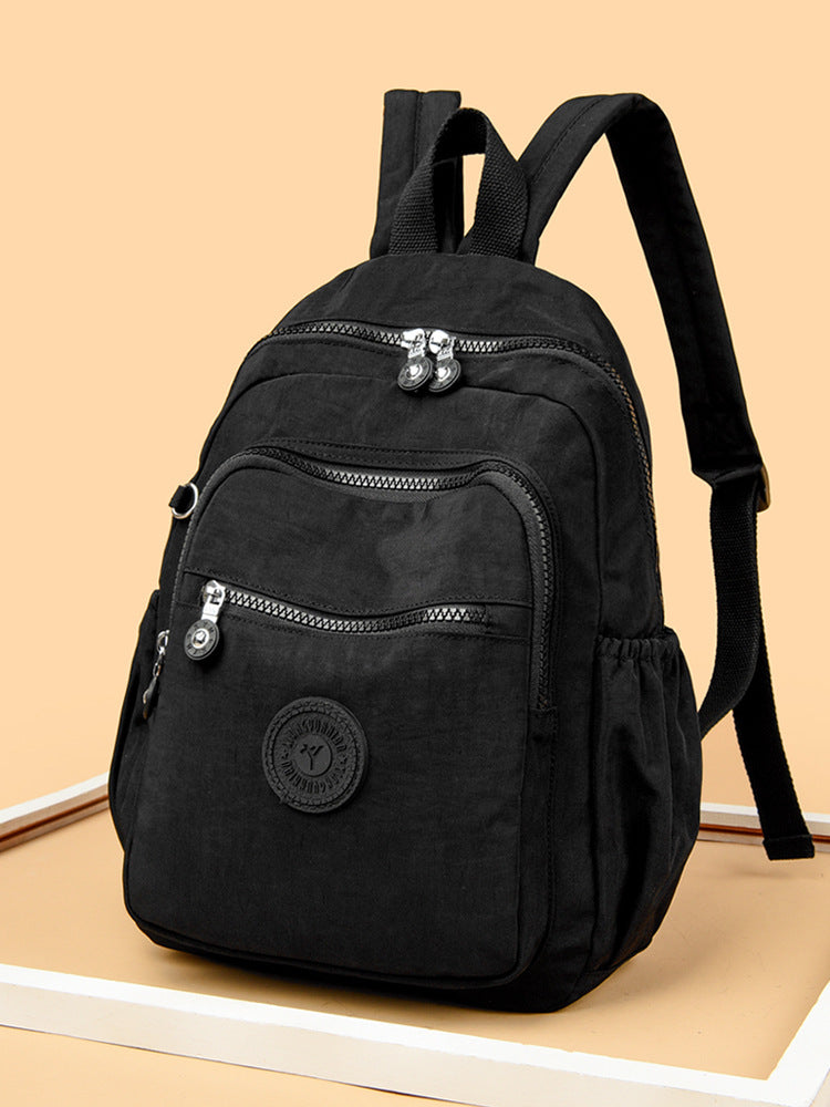 Mochila Feminina Leve e Impermeável com Design Casual e Vários Bolsos