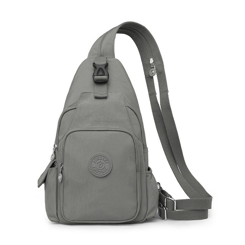 Mochila Bolsa Transversal Compacta Unissex – Uso de Ombro ou Costas, Material Impermeável, Leve e Versátil XV-2411