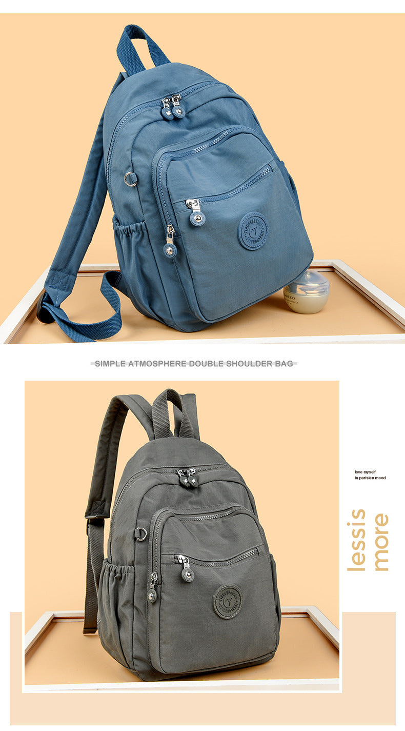 Mochila Feminina Leve e Impermeável com Design Casual e Vários Bolsos