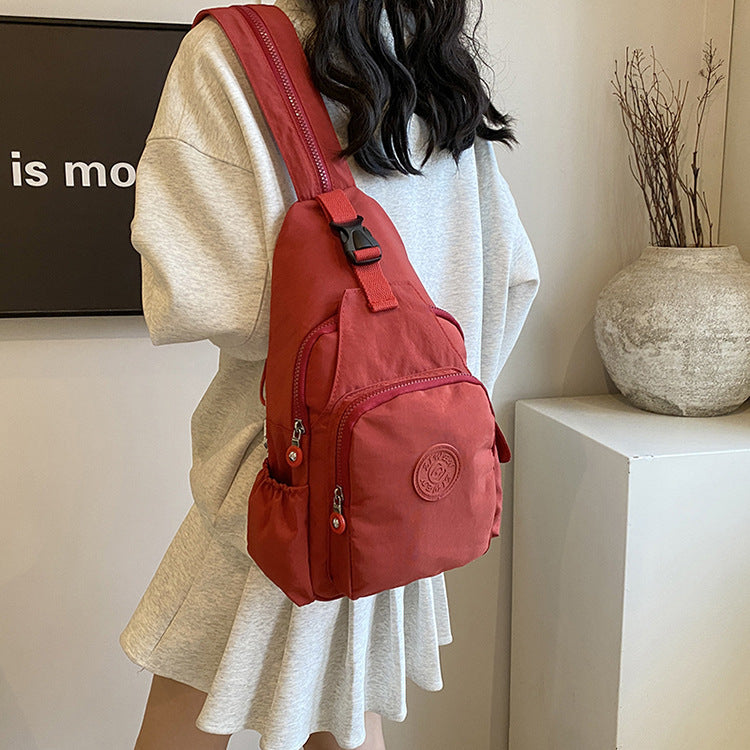 Mochila Bolsa Transversal Compacta Unissex – Uso de Ombro ou Costas, Material Impermeável, Leve e Versátil XV-2411