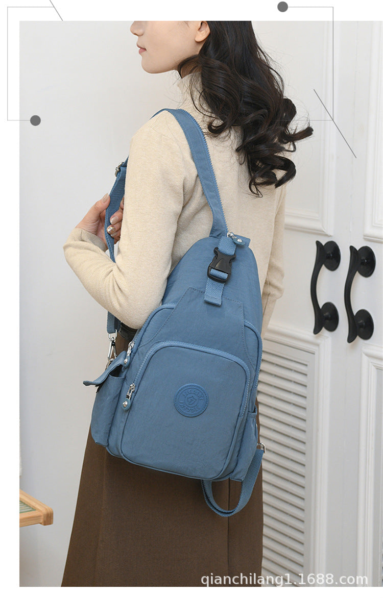 Mochila Bolsa Transversal Compacta Unissex – Uso de Ombro ou Costas, Material Impermeável, Leve e Versátil XV-2411