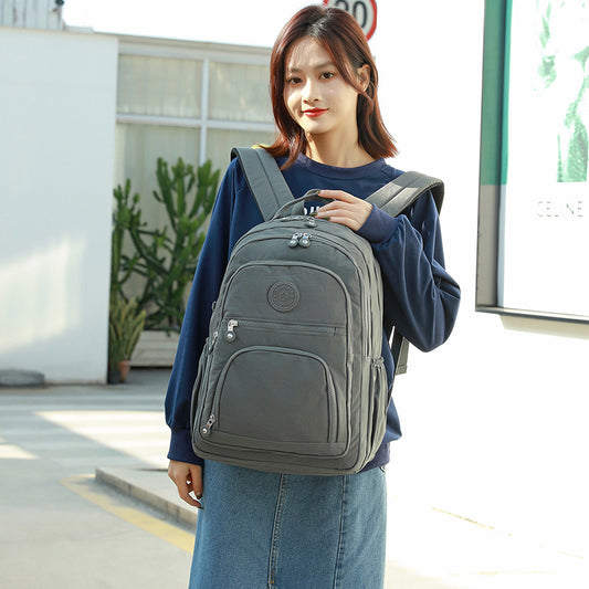 Xaviera Bolsa Mochila feminina grande impermeável nylon vários compartimentos leve com Bolso Antifurto e Espaço para NotebookXV-2418