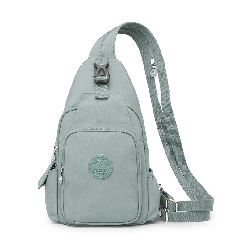 Mochila Bolsa Transversal Compacta Unissex – Uso de Ombro ou Costas, Material Impermeável, Leve e Versátil XV-2411