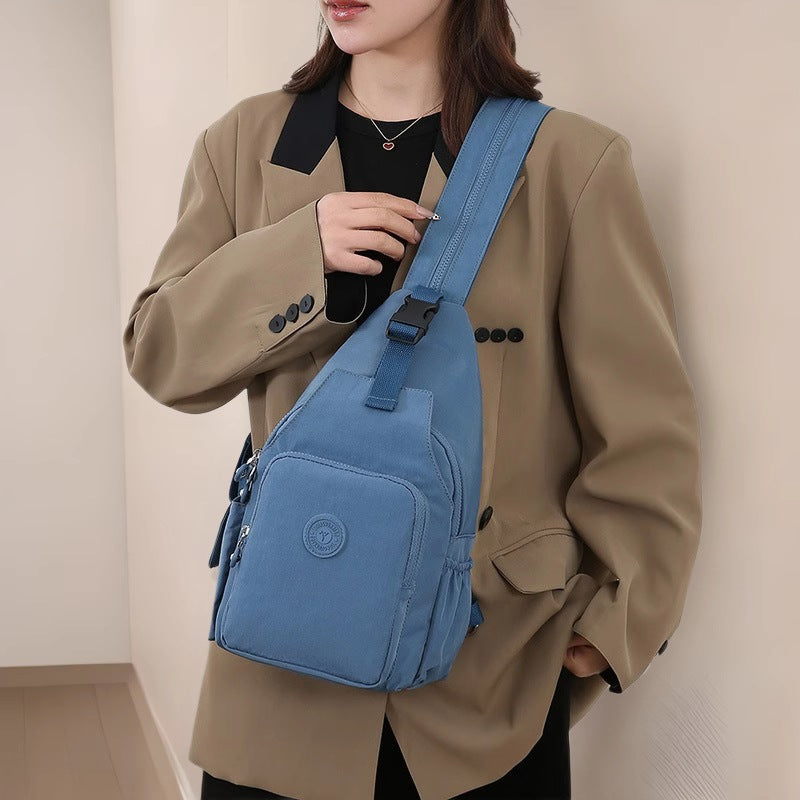 Mochila Bolsa Transversal Compacta Unissex – Uso de Ombro ou Costas, Material Impermeável, Leve e Versátil XV-2411
