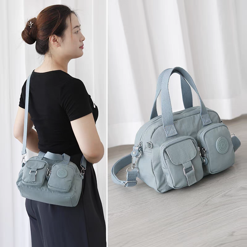 Xaviera Bolsa feminina nylon impermeavel De mao e alca transversal tiracolo XV-2408