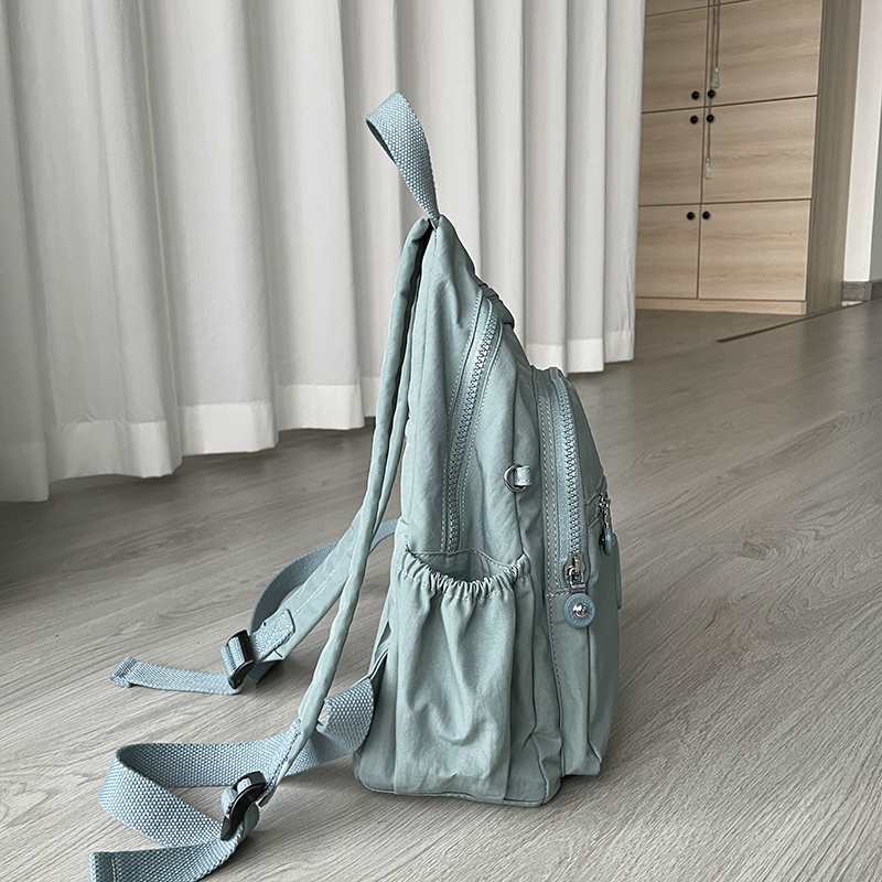 Mochila Feminina Leve e Impermeável com Design Casual e Vários Bolsos