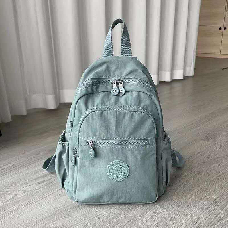 Mochila Feminina Leve e Impermeável com Design Casual e Vários Bolsos