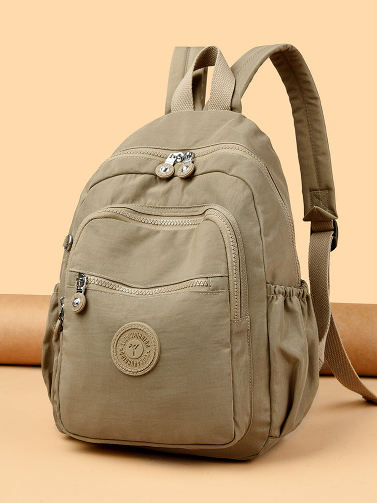 Mochila Feminina Leve e Impermeável com Design Casual e Vários Bolsos