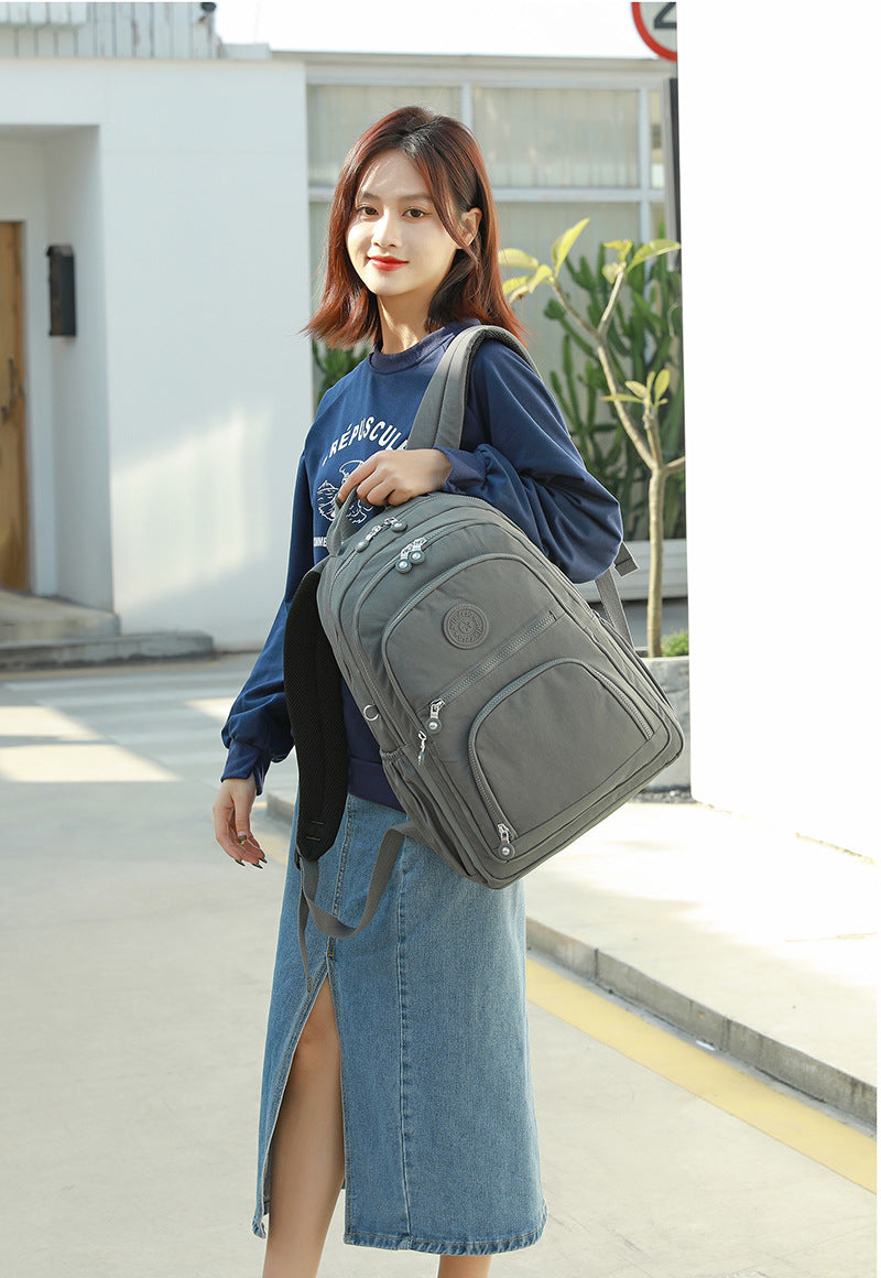 Xaviera Bolsa Mochila feminina grande impermeável nylon vários compartimentos leve com Bolso Antifurto e Espaço para NotebookXV-2418