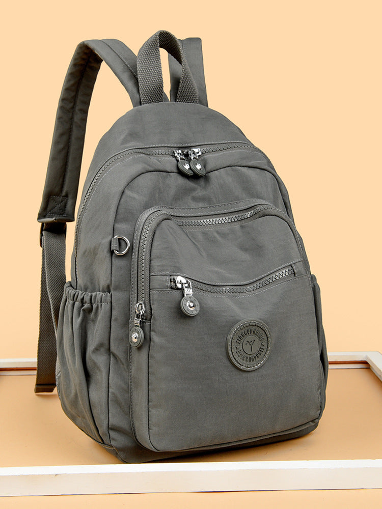 Mochila Feminina Leve e Impermeável com Design Casual e Vários Bolsos
