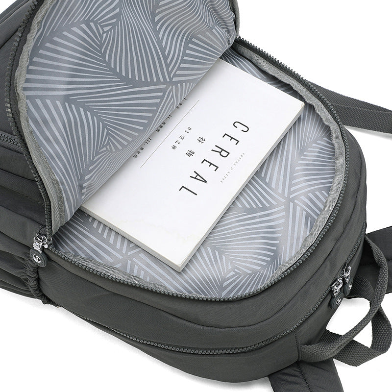 Xaviera Bolsa Mochila feminina grande impermeável nylon vários compartimentos leve com Bolso Antifurto e Espaço para NotebookXV-2418